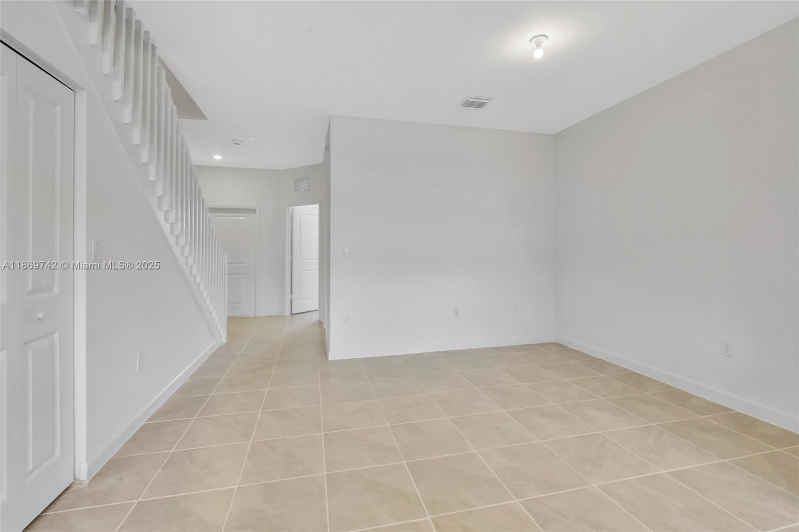 12206 Northwest 23rd Avenue Miami, FL 33167 - Photo 6 of 25 a view of an empty room