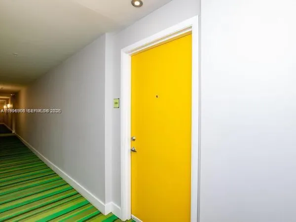 a view of a swimming pool from a balcony