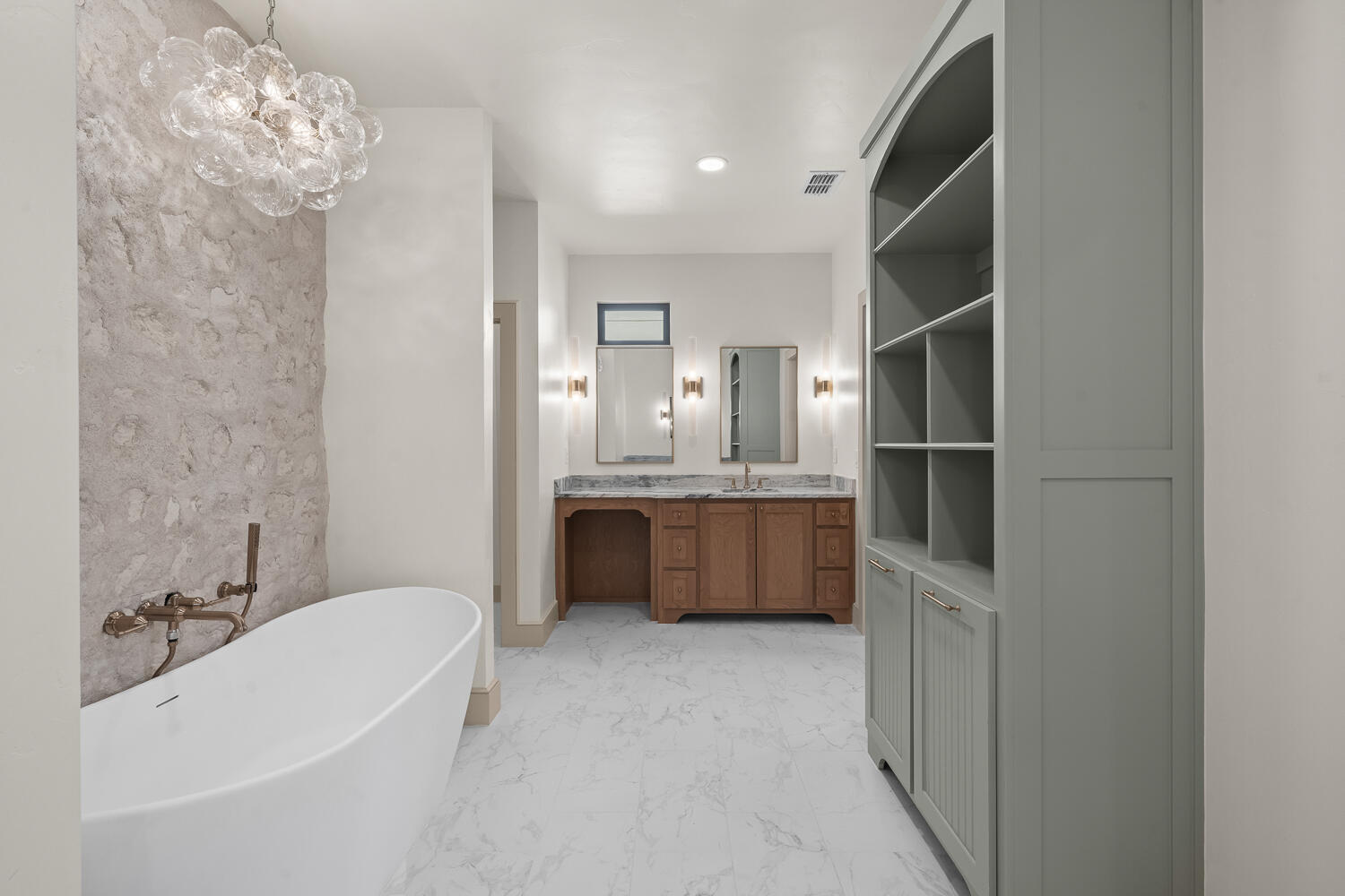 3911 149th Street Lubbock, TX 79423 - Photo 40 of 79 a bathroom with a tub sink a mirror and a shower