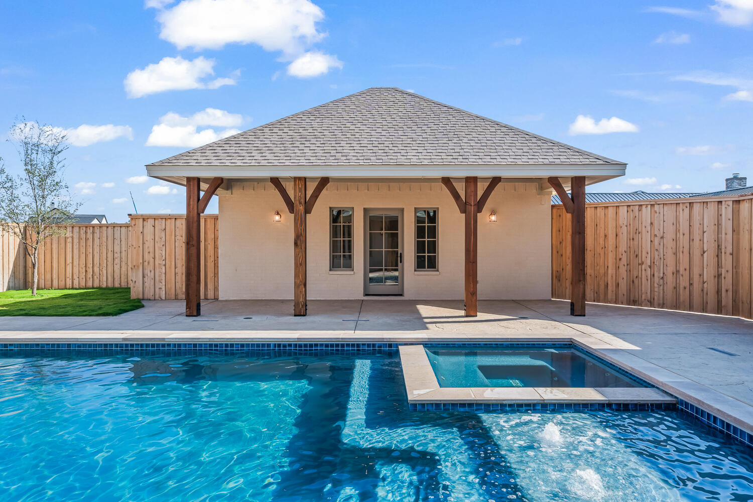 3911 149th Street Lubbock, TX 79423 - Photo 6 of 79 a front view of a house with a yard