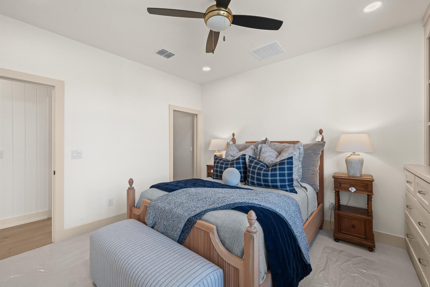 3911 149th Street Lubbock, TX 79423 - Photo 61 of 79 a bedroom with a bed and ceiling fan