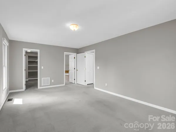 a view of a room with an empty space