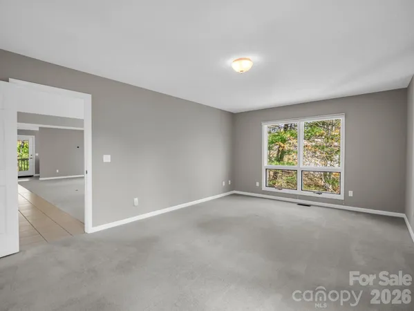 a bathroom with sinks double vanity and a window