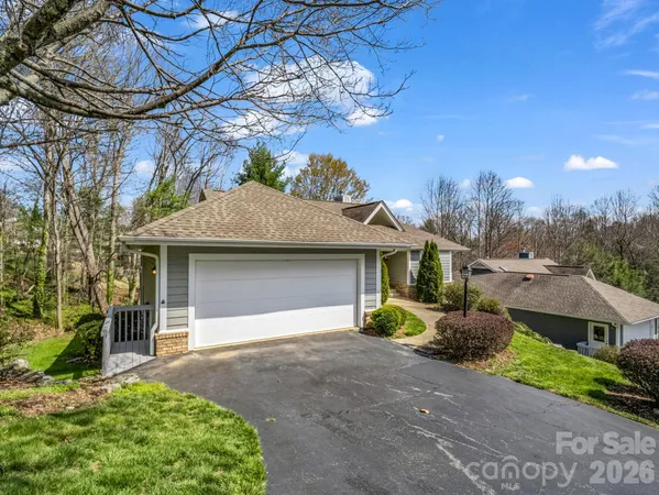 an aerial view of a house with a garden