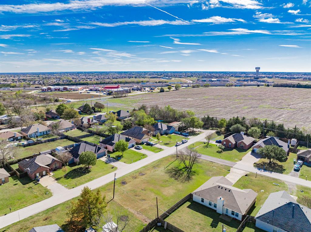 Tbd Apple Tree Lane Fate, TX 75087 - Photo 4 of 8 Aerial perspective of suburban area