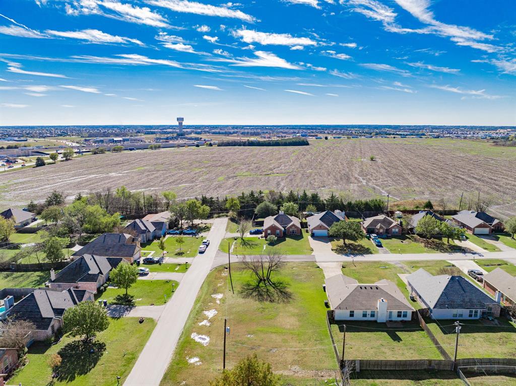 Tbd Apple Tree Lane Fate, TX 75087 - Photo 5 of 8 Aerial view of sparsely populated area with nearby suburban area