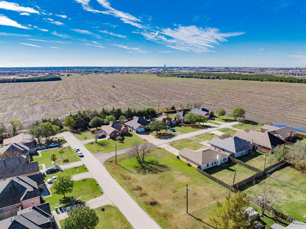 Tbd Apple Tree Lane Fate, TX 75087 - Photo 7 of 8 Aerial view of sparsely populated area with nearby suburban area and extensive farmland