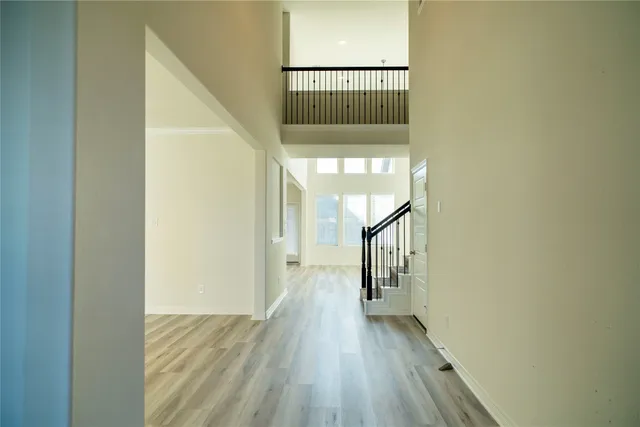 a view of hallway with stairs