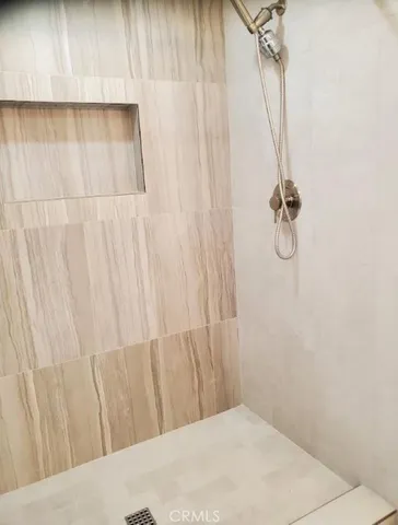 a view of a room with a white door