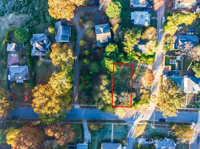 a front view of a houses with yard