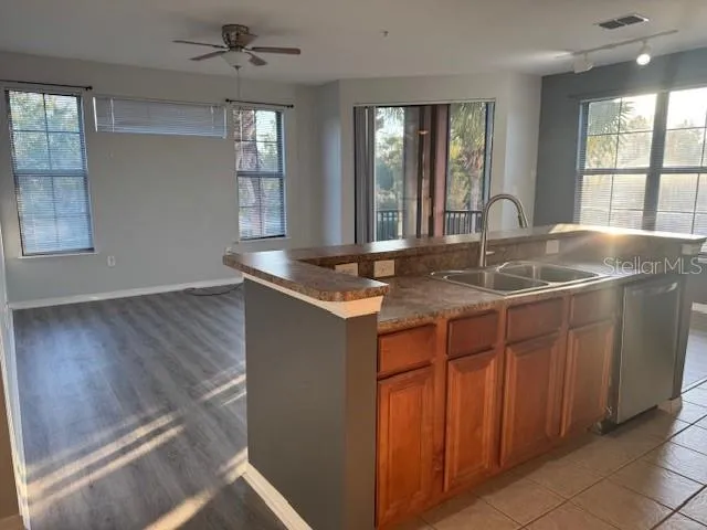a kitchen with sink and window