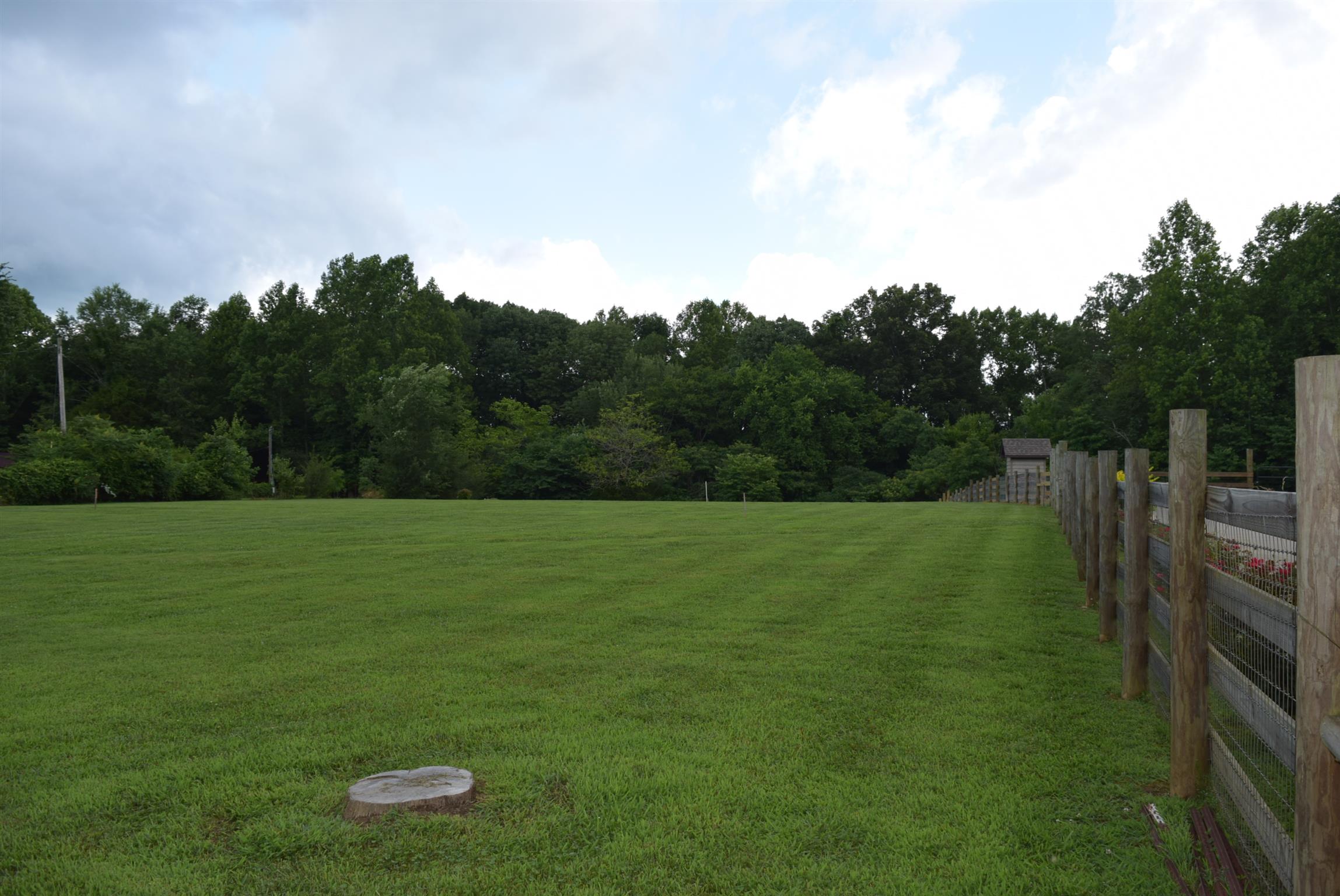 0 Lyndell Bell Road Manchester, TN 37355 - Photo 1 of 7 a view of a golf course with a lake