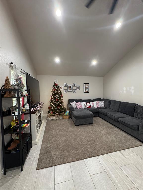 1610 Ridgeview Circle Granbury, TX 76048 - Photo 13 of 13 a living room with furniture and a window