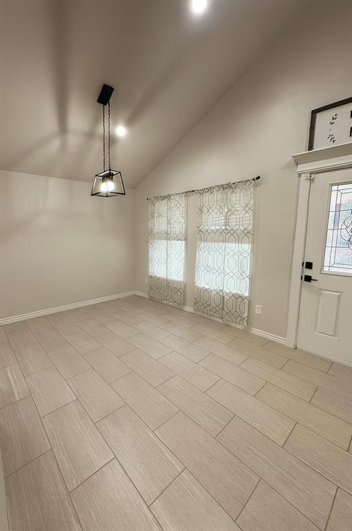 1610 Ridgeview Circle Granbury, TX 76048 - Photo 5 of 13 a view of empty room with a fireplace