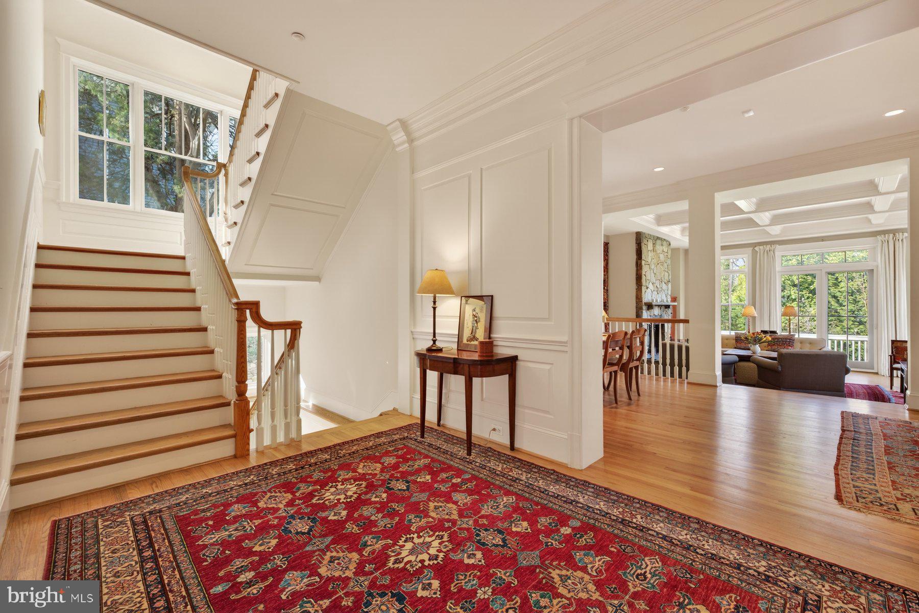 6115 Madawaska Road Bethesda, MD 20816 - Photo 15 of 78 a living room with furniture and a rug