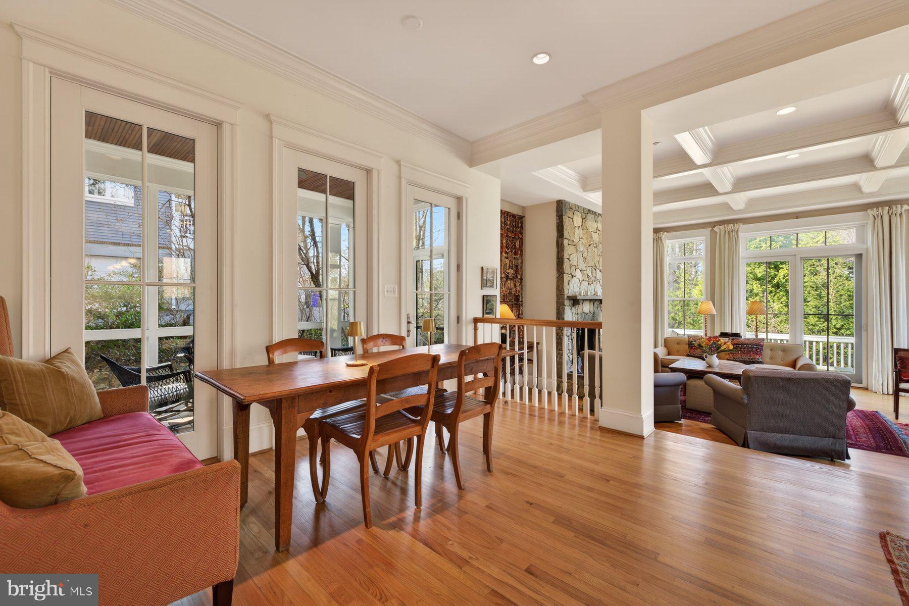 6115 Madawaska Road Bethesda, MD 20816 - Photo 17 of 78 a view of a livingroom with furniture window and wooden floor