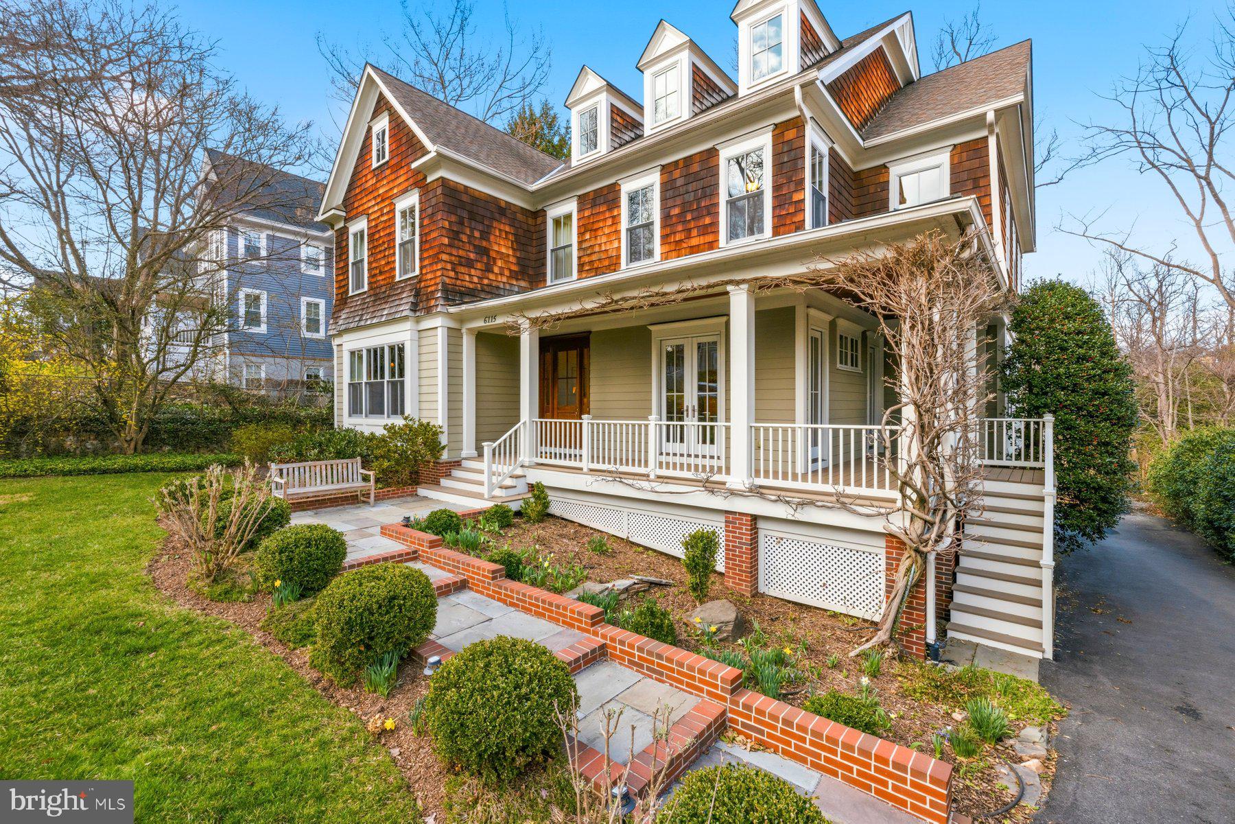 6115 Madawaska Road Bethesda, MD 20816 - Photo 4 of 78 a front view of a house with garden