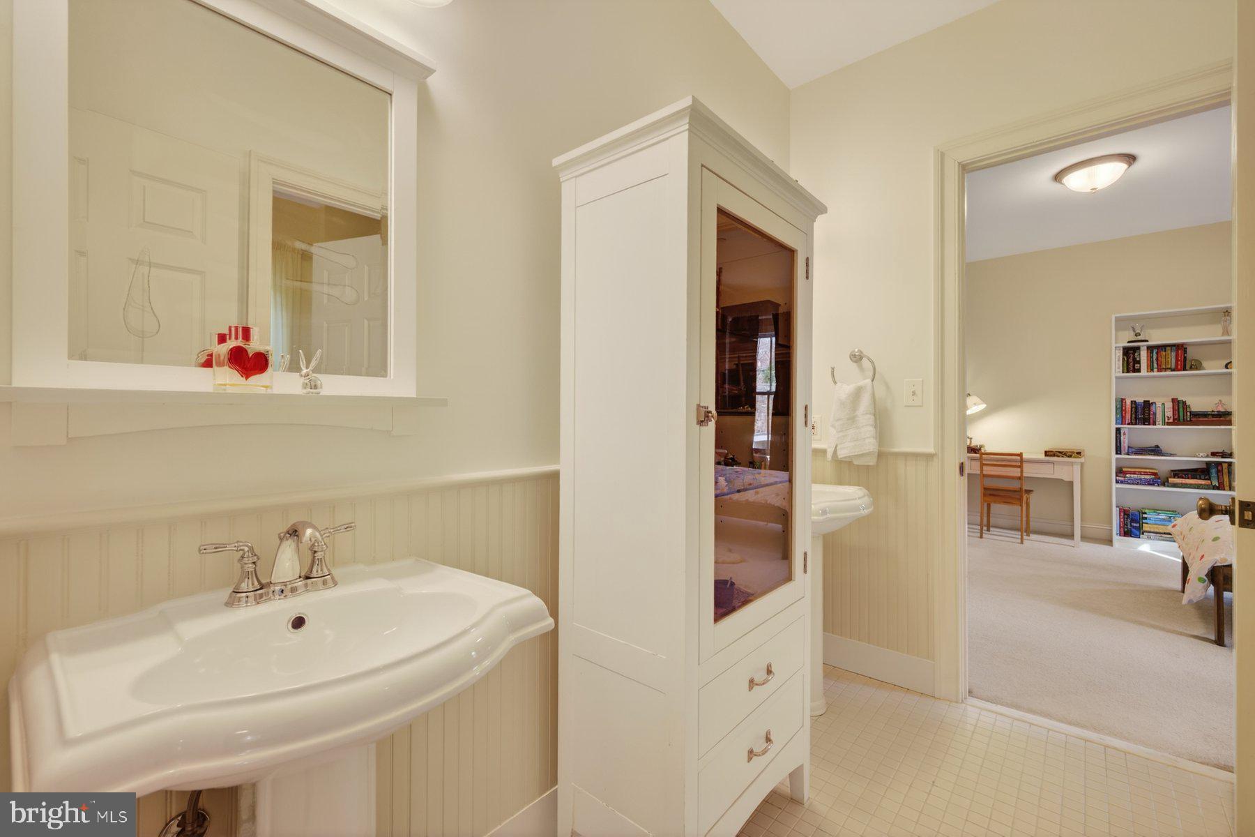 6115 Madawaska Road Bethesda, MD 20816 - Photo 46 of 78 'Jack and Jill' full bath (joining bedrooms 3 + 4)