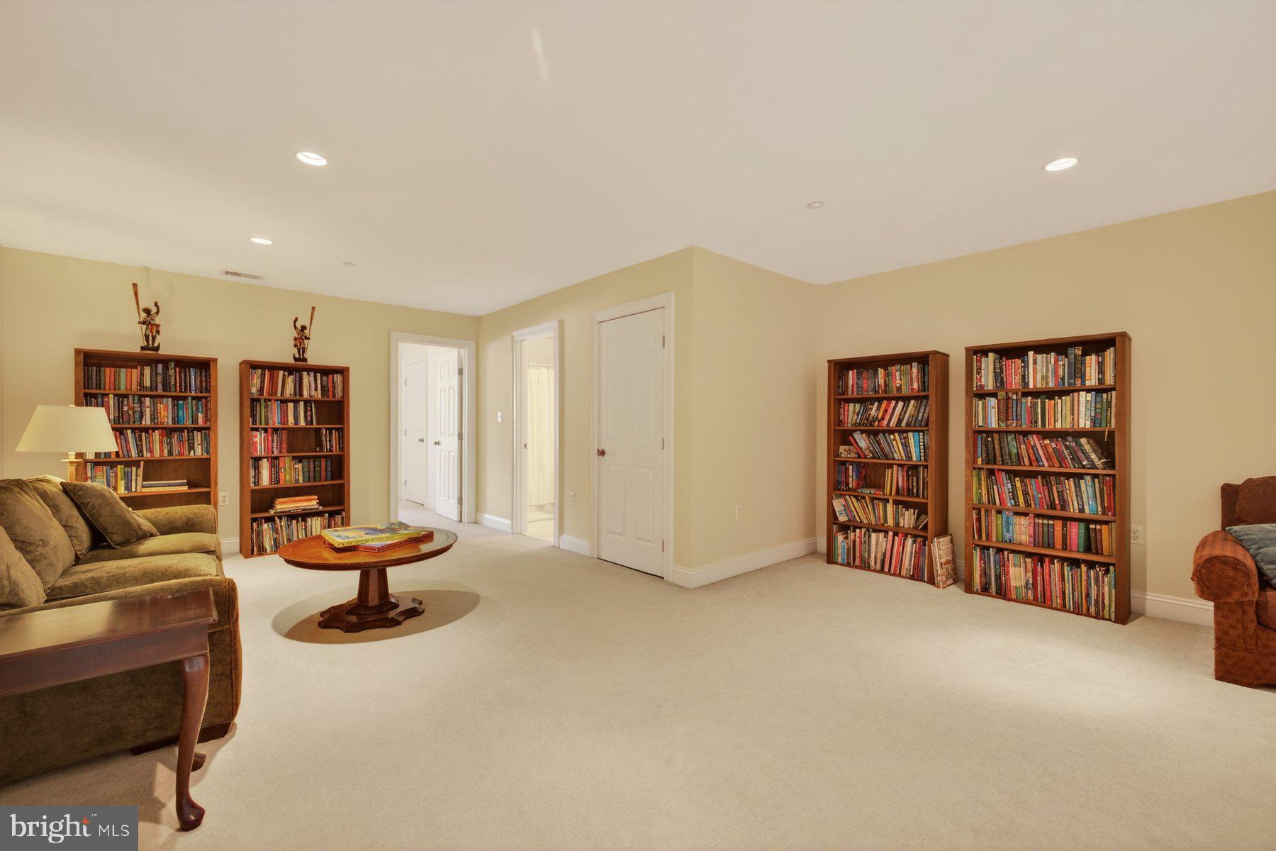 6115 Madawaska Road Bethesda, MD 20816 - Photo 50 of 78 a view of an empty room with furniture and staircase