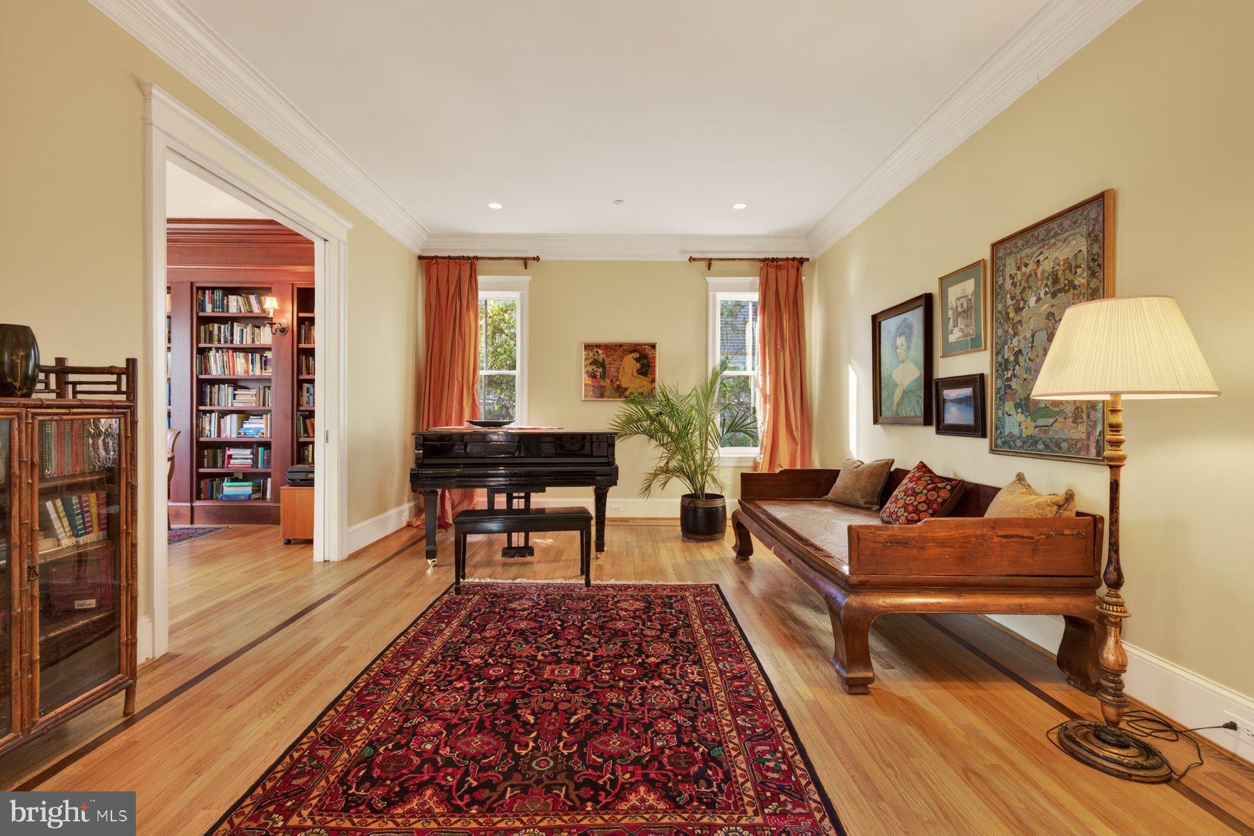 6115 Madawaska Road Bethesda, MD 20816 - Photo 7 of 78 a living room with furniture and a rug