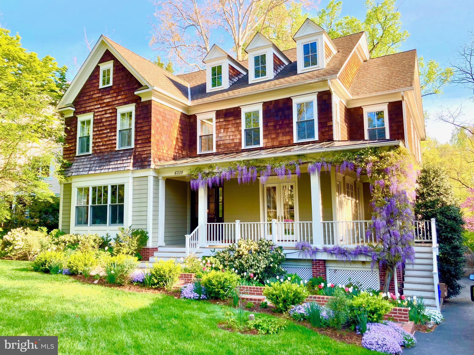6115 Madawaska Road Bethesda, MD 20816 - Photo 74 of 78 front view of a house with a yard