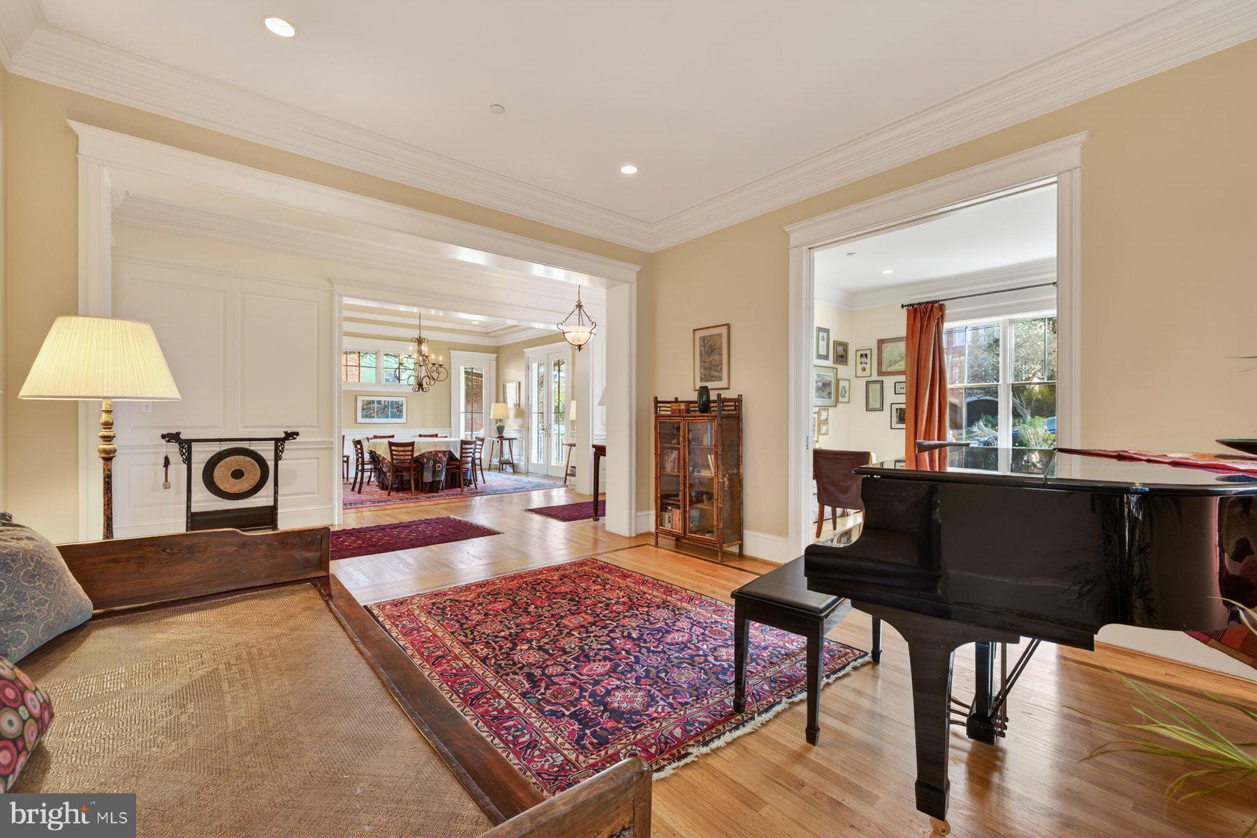 6115 Madawaska Road Bethesda, MD 20816 - Photo 9 of 78 a living room with a couch and a table