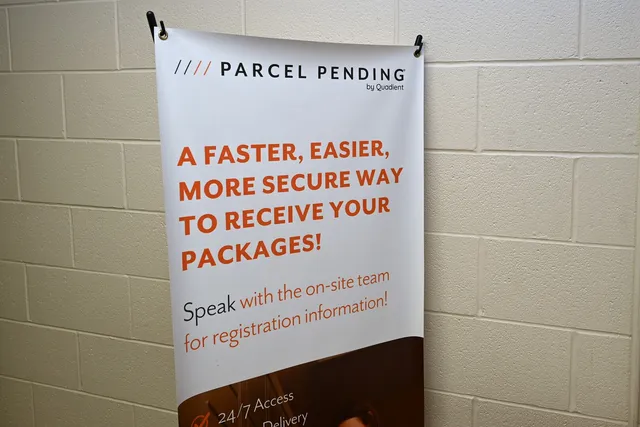 a lobby with furniture and a table