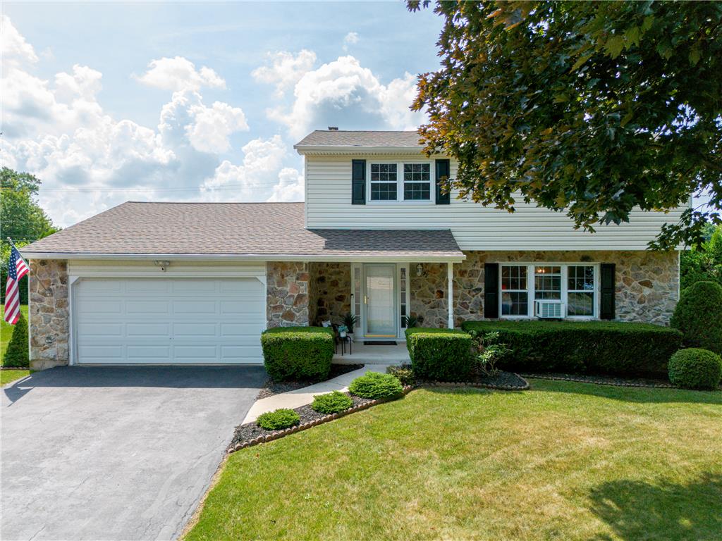 2130 Wisteria Road Lower Macungie Township, PA 18062 - Photo 1 of 48 A classic facade combining stone and siding creates appealing curb presence.