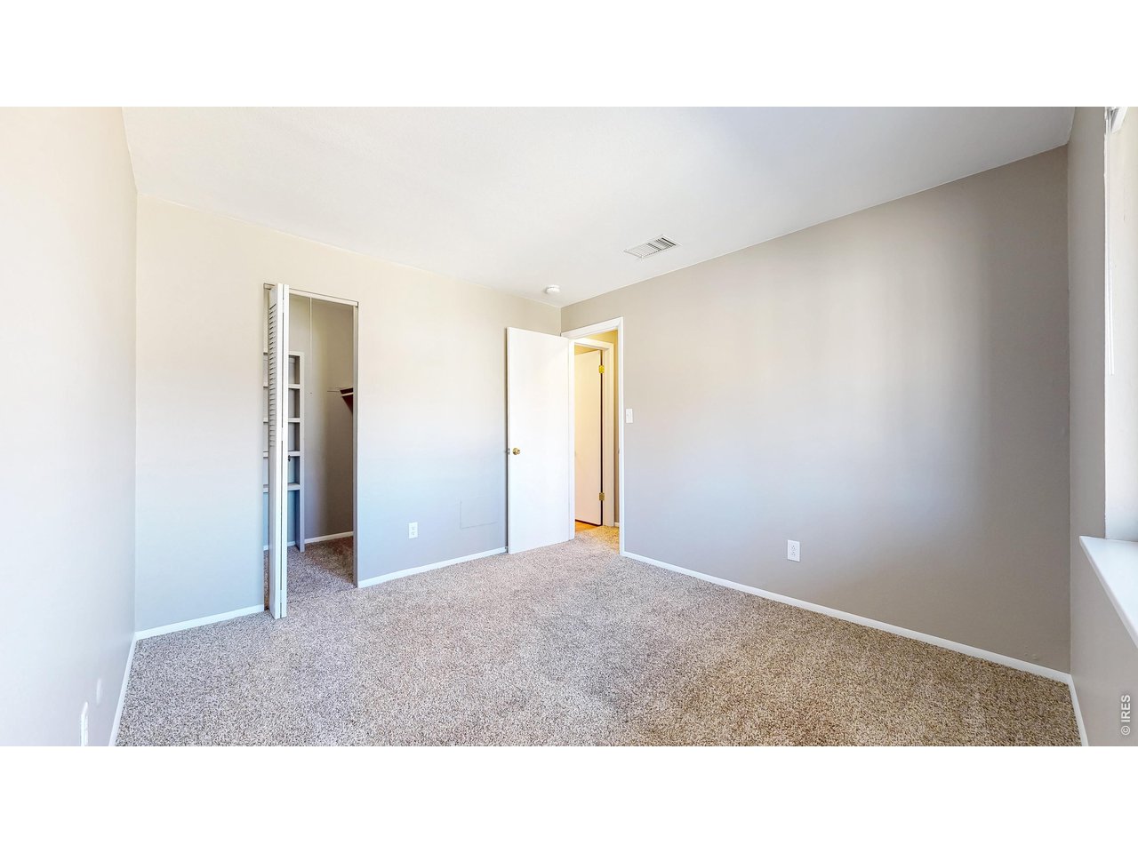 1705 Heatheridge Road, Unit 301 Fort Collins, CO 80526 - Photo 16 of 26 Primary Bedroom & Walk-In Closet