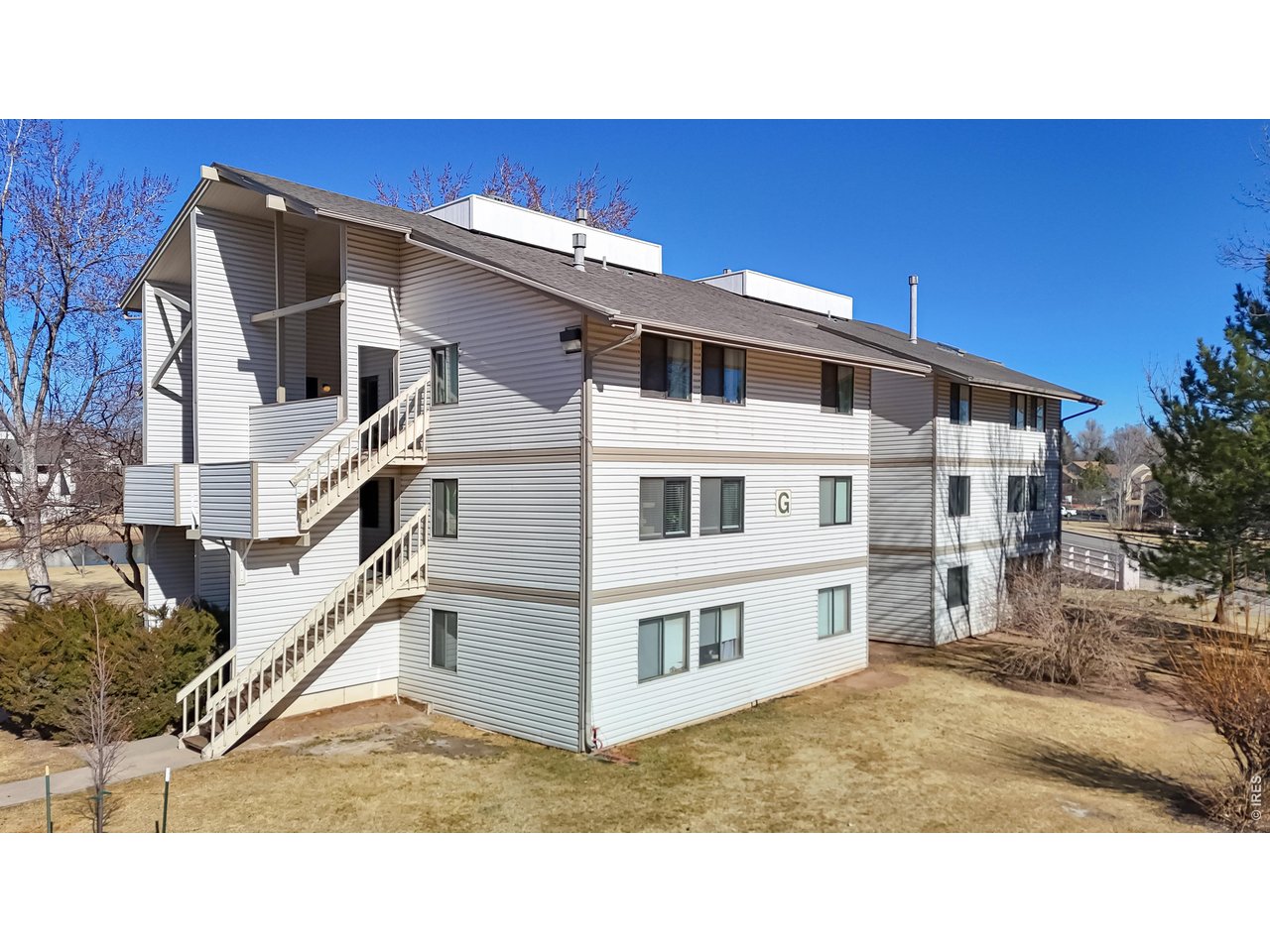 1705 Heatheridge Road, Unit 301 Fort Collins, CO 80526 - Photo 2 of 26 1705 Heatheridge Rd G301 Is an End Unit with Gorgeous Views