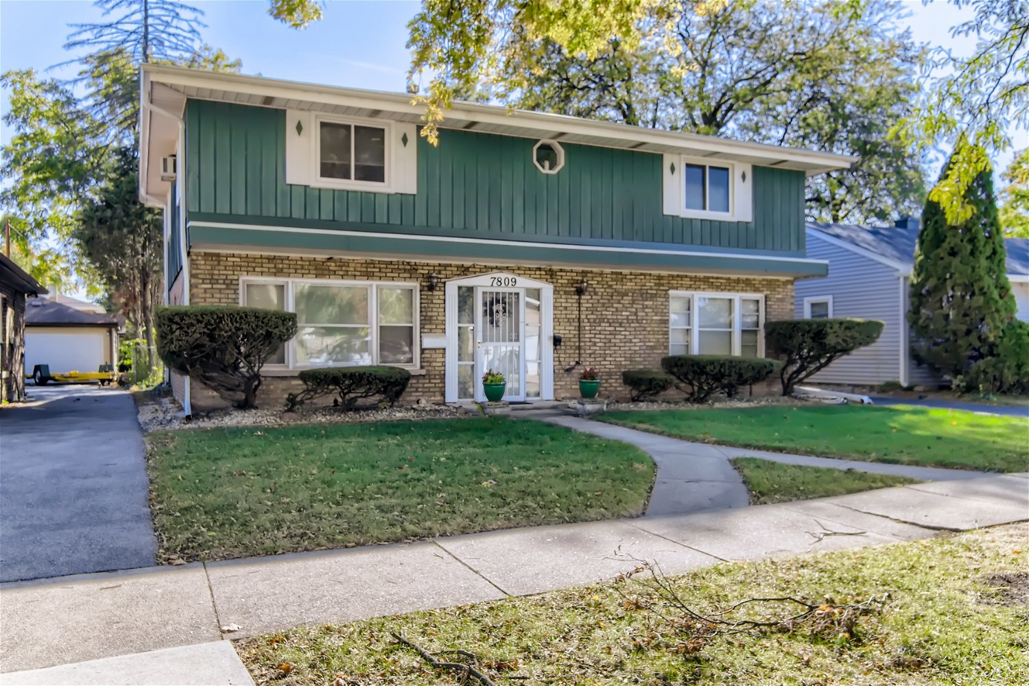 7809 45th Street Lyons, IL 60534 - Photo 1 of 19 a view of a house with a yard