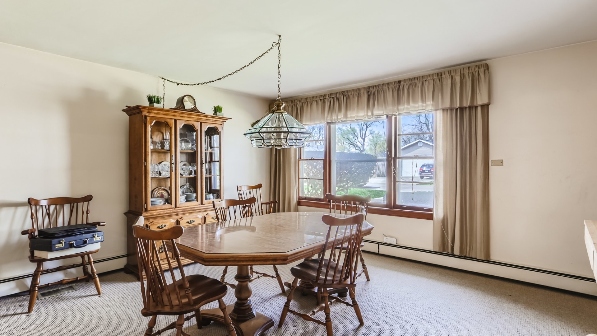 7809 45th Street Lyons, IL 60534 - Photo 4 of 19 a view of a dining room with furniture window and outside view