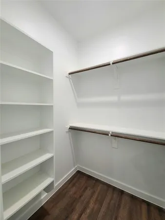 a view of an empty room with empty racks