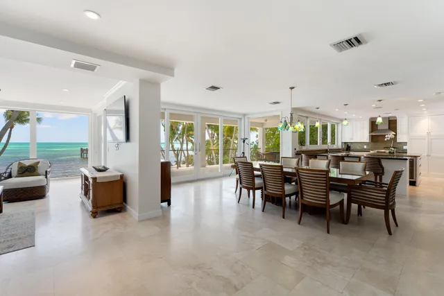 a bedroom with a bed and a flat tv screen