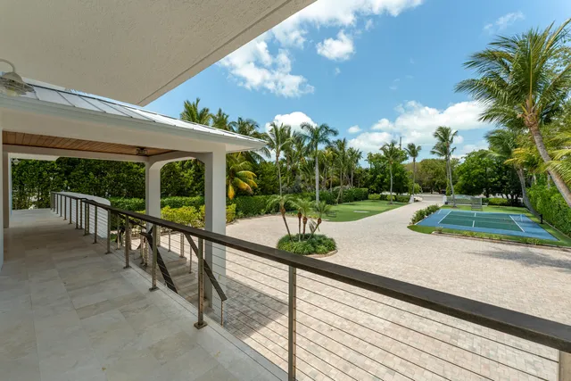 a bathroom with a tub sink and a mirror