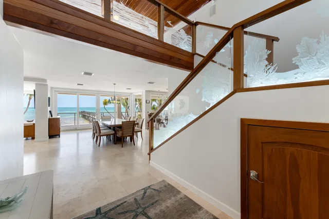 a hallway with potted plant in front of it