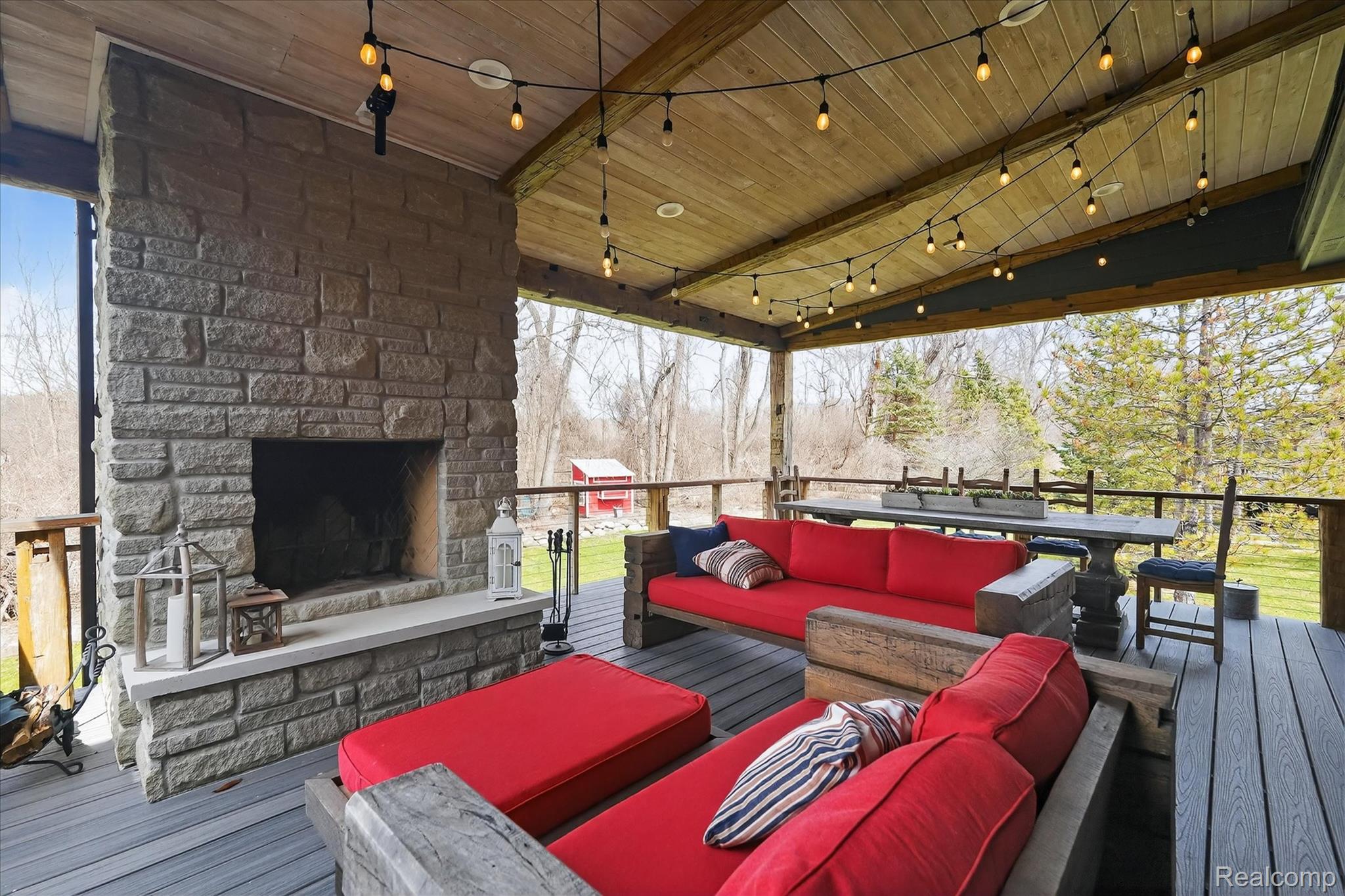 6932 Oakhurst Ridge Road Clarkston, MI 48348 - Photo 61 of 78 Wooden terrace with an outdoor living space with a fireplace