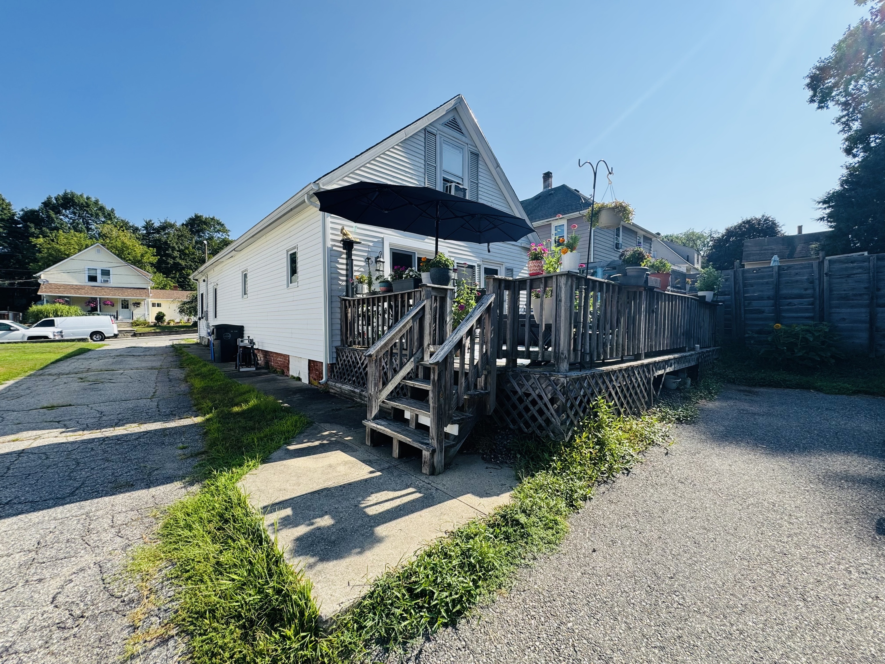 a view of a chair and table in the patio
