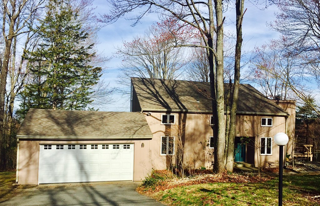 a view of outdoor space kitchen with large trees