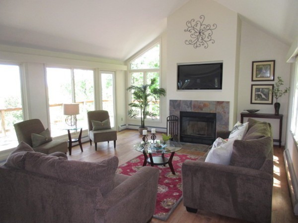 47 Arnold Road Pelham, MA 01002 - Photo 18 of 30 a living room with furniture fireplace and window