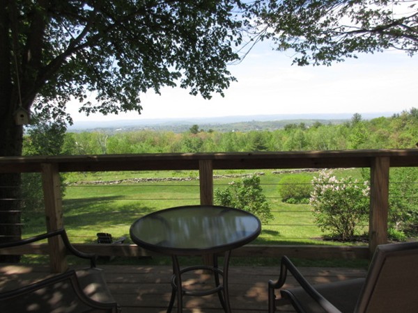 47 Arnold Road Pelham, MA 01002 - Photo 3 of 30 a view of a lot of chairs and a table