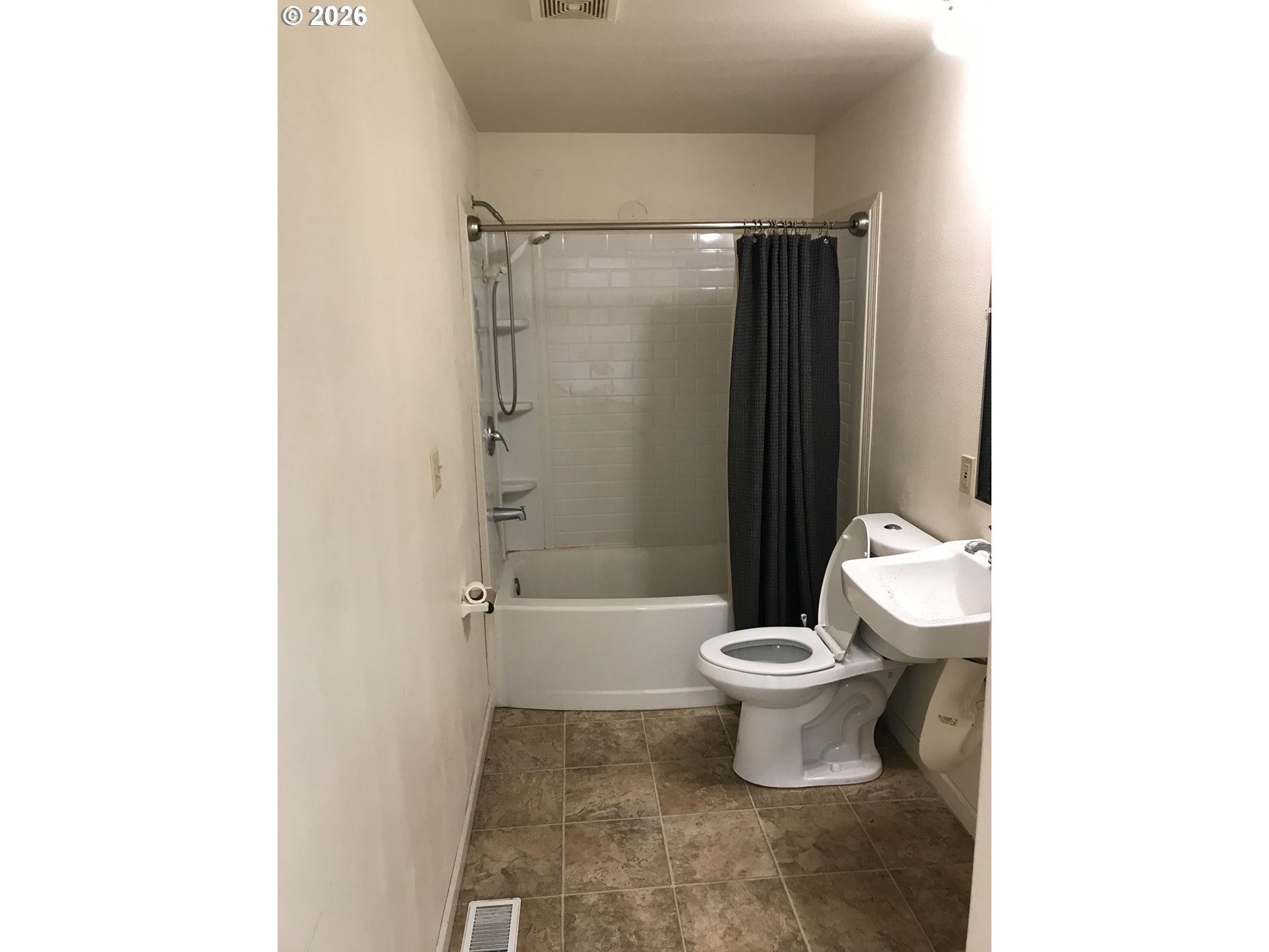 51 Southwest Brantley Drive Winston, OR 97496 - Photo 5 of 6 a bathroom with a toilet and a shower