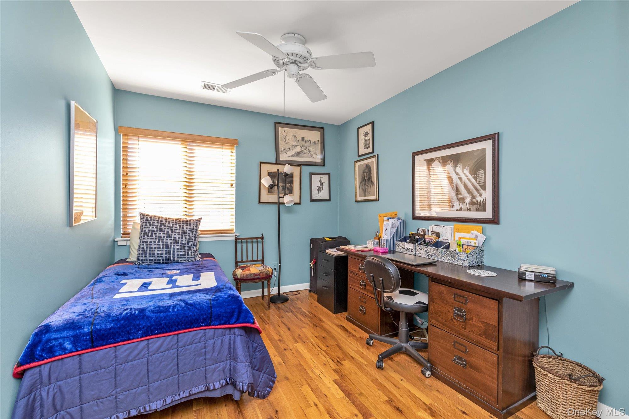 15 Spring Hollow Road Roslyn, NY 11576 - Photo 16 of 30 a bedroom with a bed and wooden floor