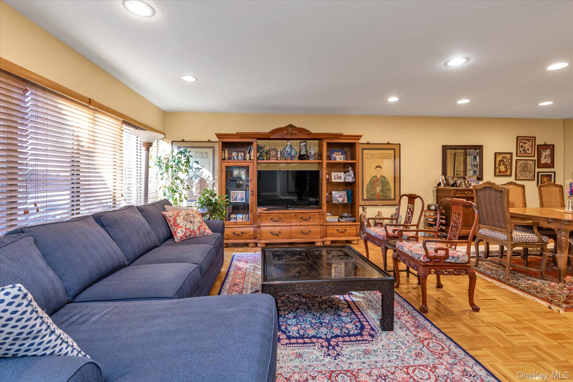 15 Spring Hollow Road Roslyn, NY 11576 - Photo 4 of 30 a living room with furniture wooden floor and a large window