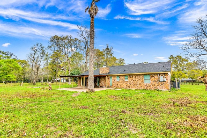 481 County Road 2084 Liberty, TX 77575 - Photo 15 of 21 Back view of home and acreage
