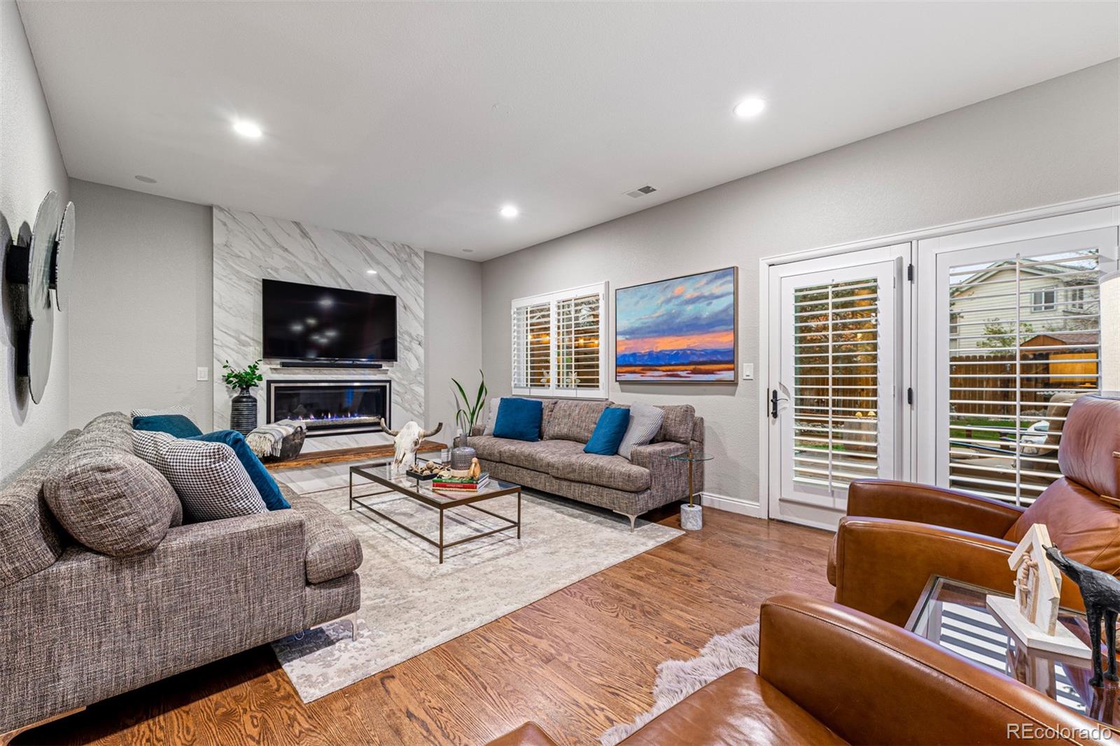 7340 Rattlesnake Drive Lone Tree, CO 80124 - Photo 12 of 33 a living room with furniture kitchen view and a window