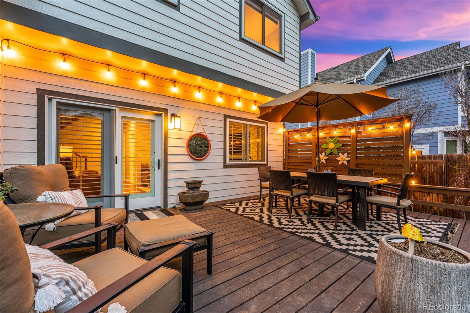 7340 Rattlesnake Drive Lone Tree, CO 80124 - Photo 28 of 33 a outdoor space with patio the couches and pool view