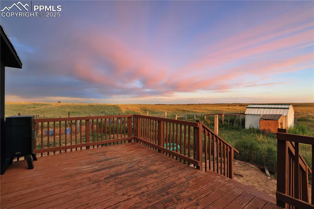 6615 Mulberry Road Calhan, CO 80808 - Photo 11 of 50 a view of balcony with wooden floor and city view