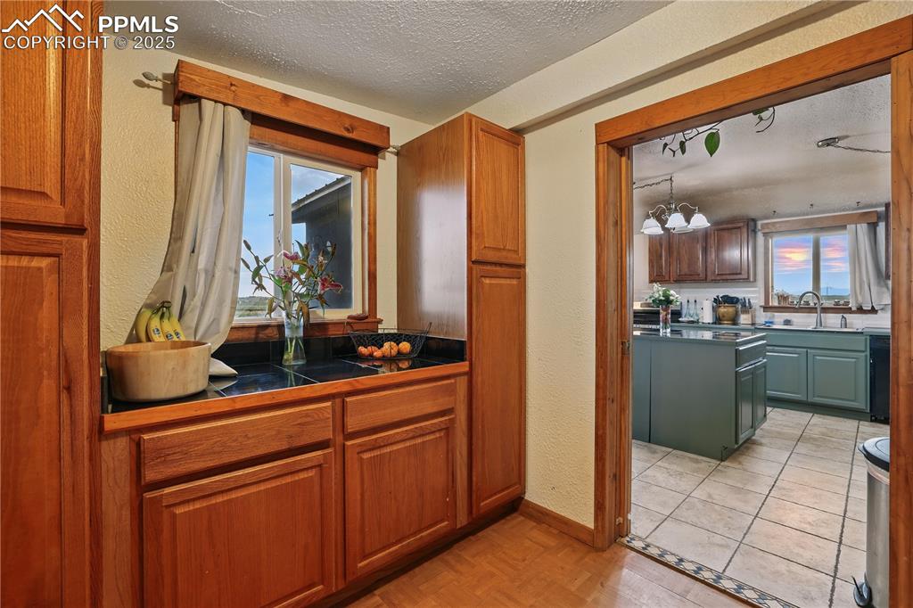 6615 Mulberry Road Calhan, CO 80808 - Photo 17 of 50 a kitchen with a sink and cabinets