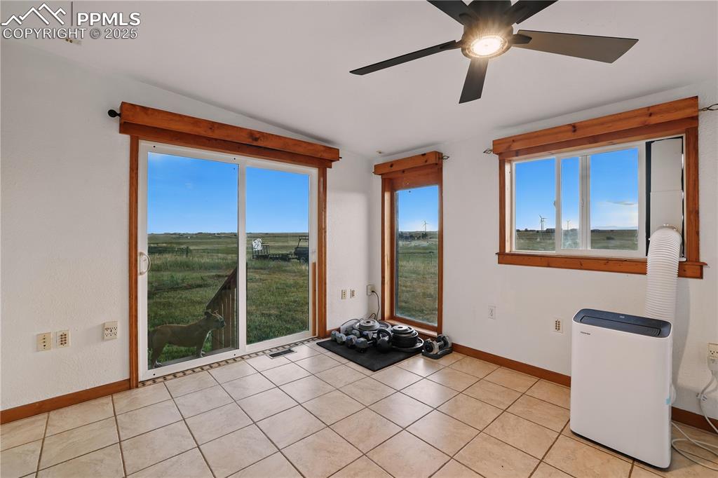 6615 Mulberry Road Calhan, CO 80808 - Photo 18 of 50 a view of a livingroom with furniture and front door